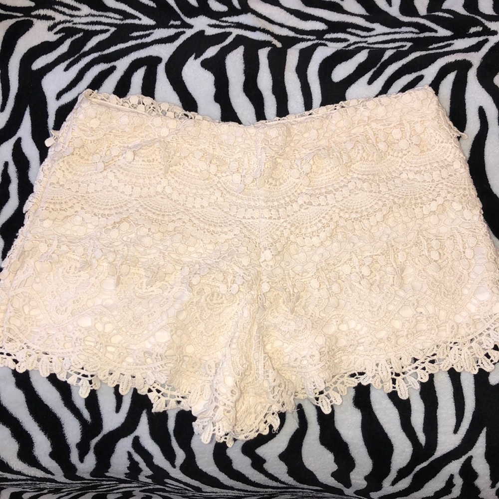 Cream lace shorts.